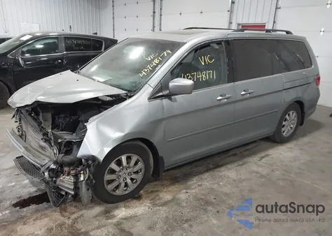 2010 Honda Odyssey Ex-L z USA, uszkodzony, nr VIN 5FNRL3H77AB107616